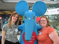 Blue mouse posing with WLT staff