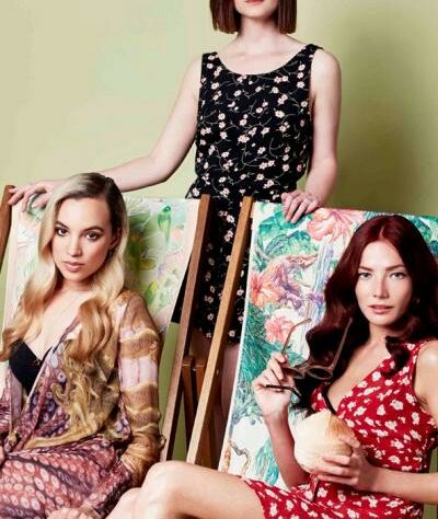 Picture of deckchairs with models Phoebe Collings James and Clara Paget, and actress Bonnie Wright