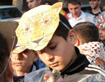 Boy in a Caucasian Leopard mask.