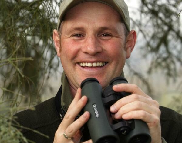 Mike Dilger with binoculars
