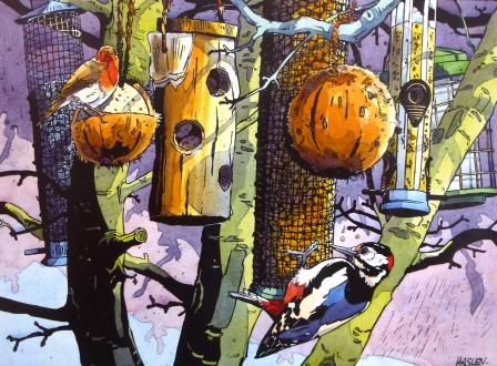 Birds at feeders in a tree.