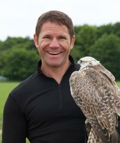 Steve Backshall with a raptor.