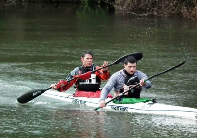 Steve Backshall and George Barnicoat in a kayak.