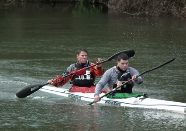Steve Backshall and George Barnicoat in a kayak.