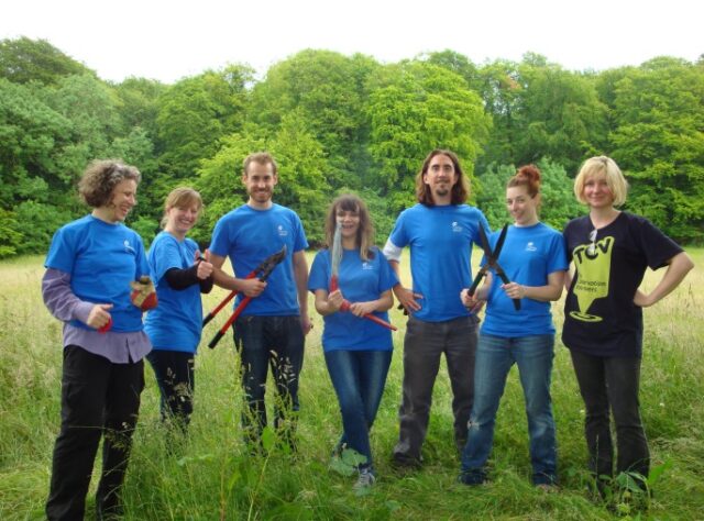 Capital Group employees with TCV Field Officer Kelly Osbourne.