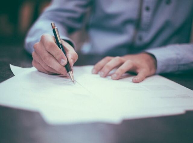 Writing a will.