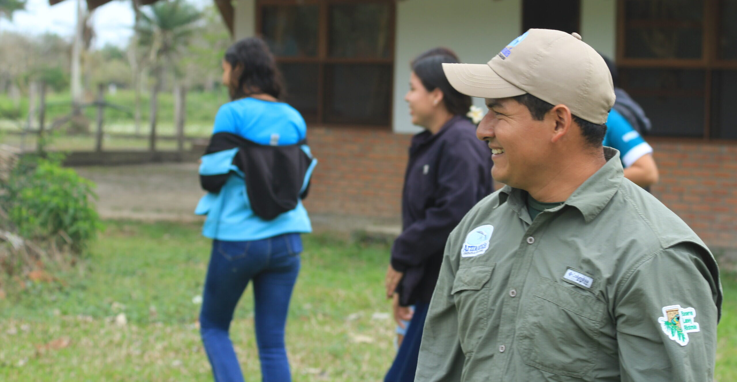 Heriberto González, one of the Laney Rickman reserve rangers, outside a building.
